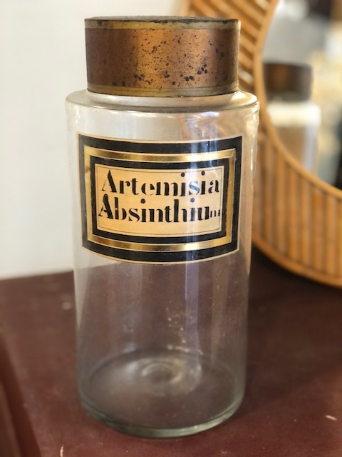 Flacon de pharmacie ou d'herboristerie ancien en verre
