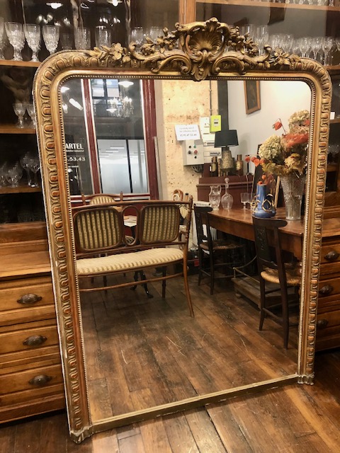 Grand miroir de cheminée en bois doré 