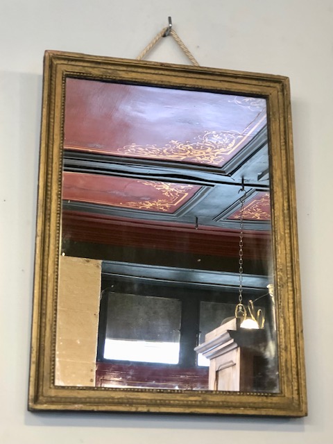 Miroir ancien en bois doré