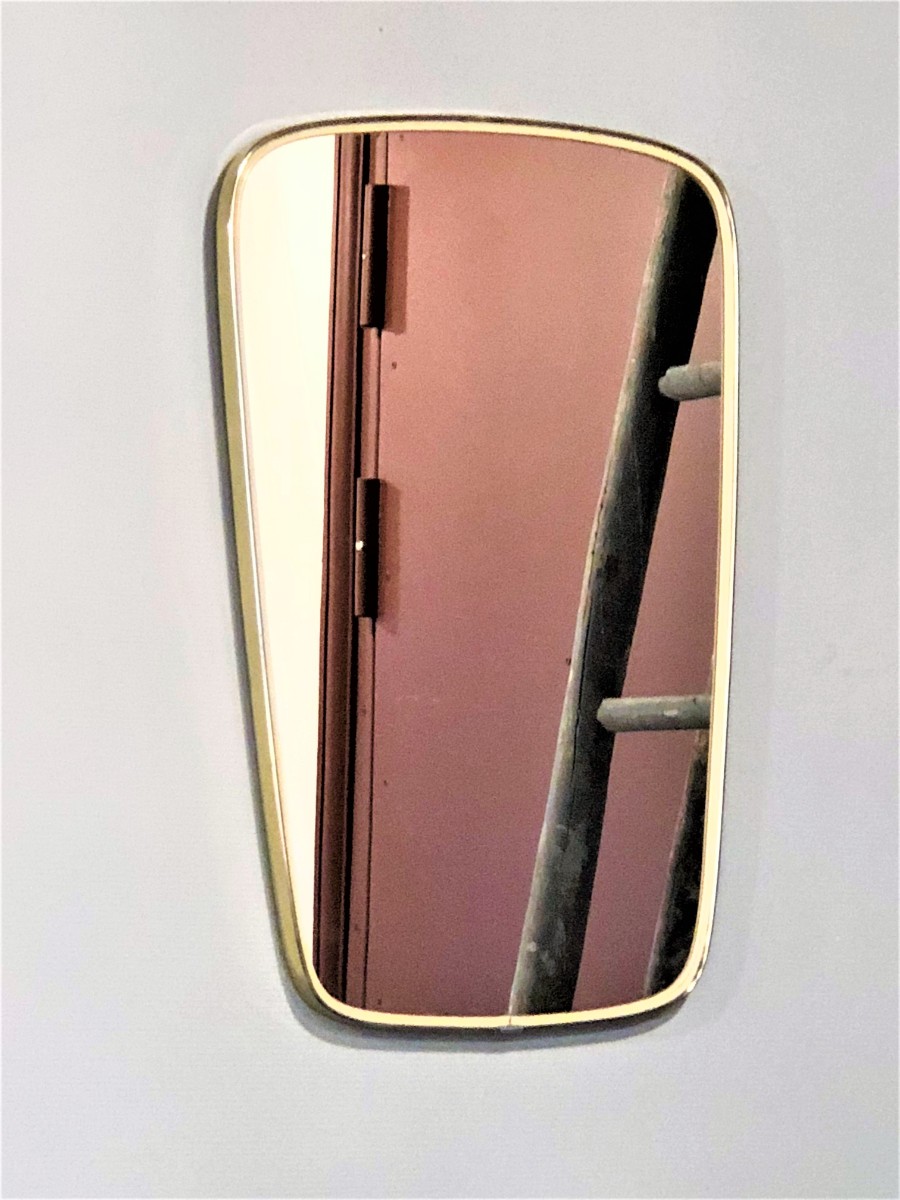 Miroir forme libre année 50 cerclé métal doré