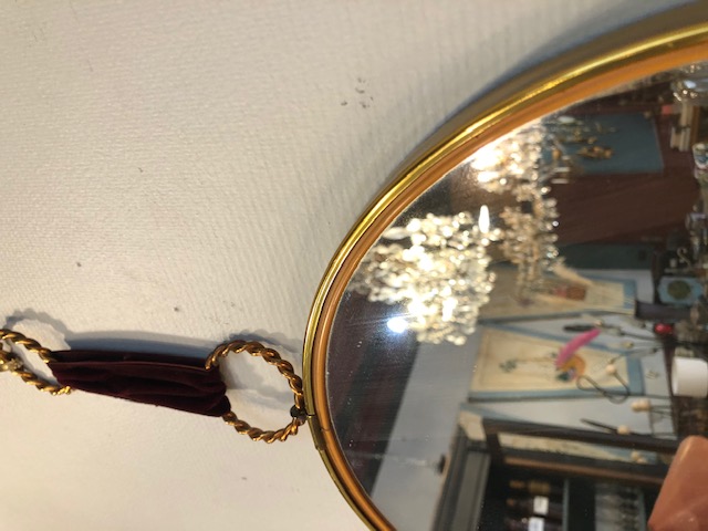 Miroir rond vintage cerclé de métal doré